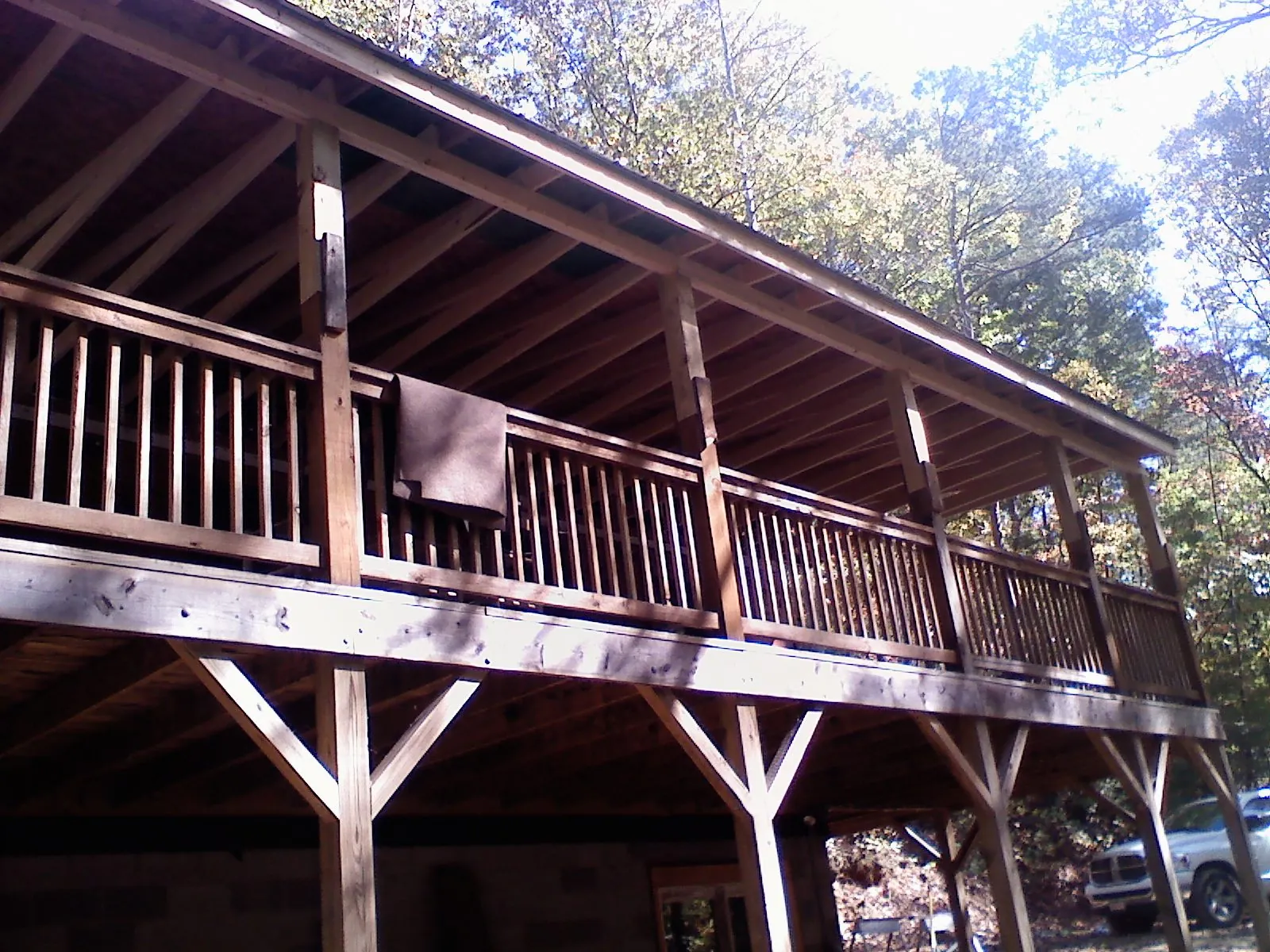 Timber framing under a new elevated porch and deck — Roof Leak Repair in Los Banos by Roofing Brothers